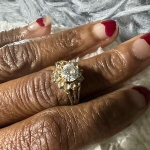 This is a vintage or antique style cluster ring -Little wear and due to age